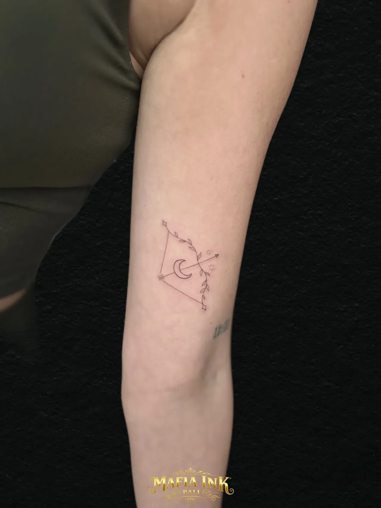 Mountain & moon outline tattoo by The Mafia Ink Bali
