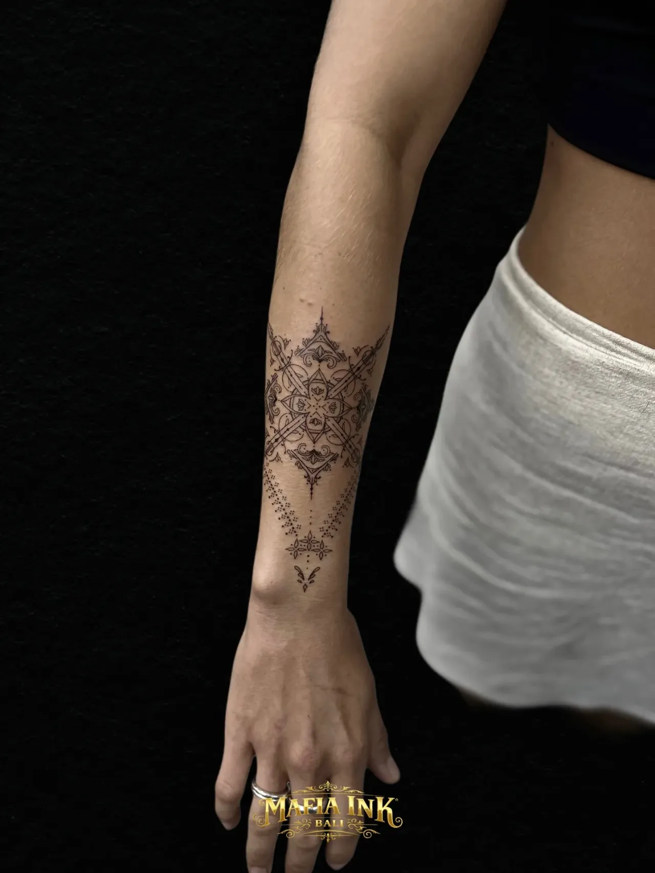 Ornamental forearm design tattoo by The Mafia Ink Bali