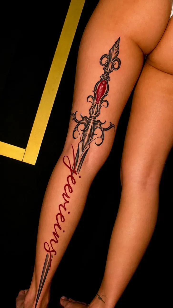 Sword & lettering tattoo by The Mafia Ink Bali
