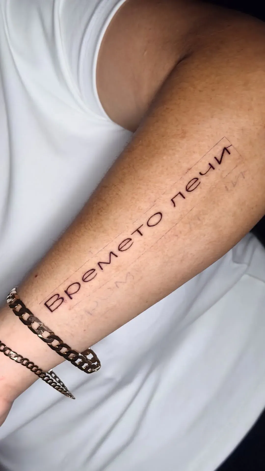Fine-line lettering tattoo by The Mafia Ink Bali