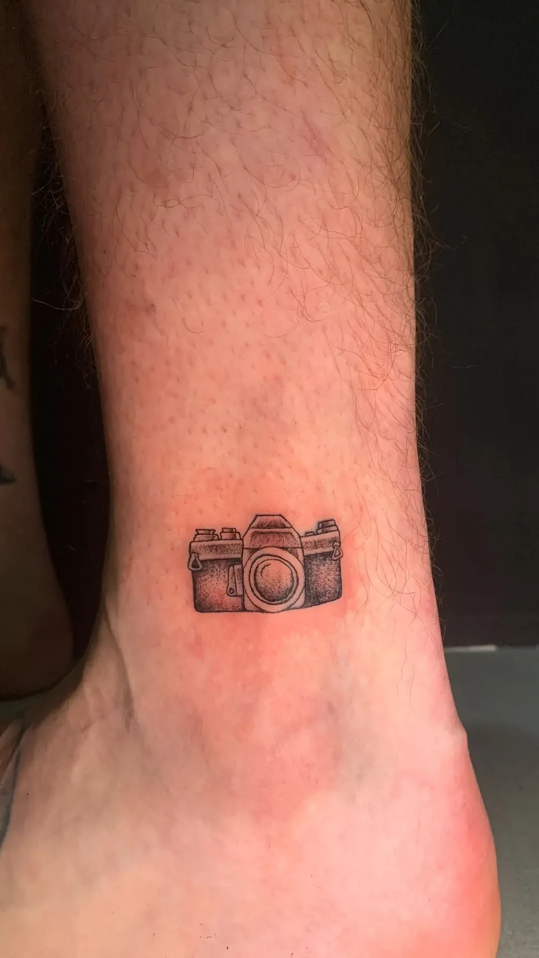 Small camera tattoo tattoo by The Mafia Ink Bali