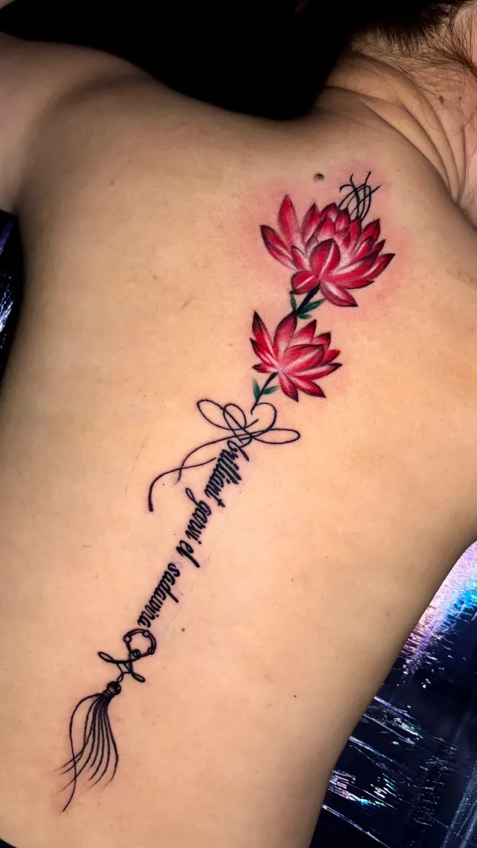 Lotus in colour tattoo by The Mafia Ink Bali