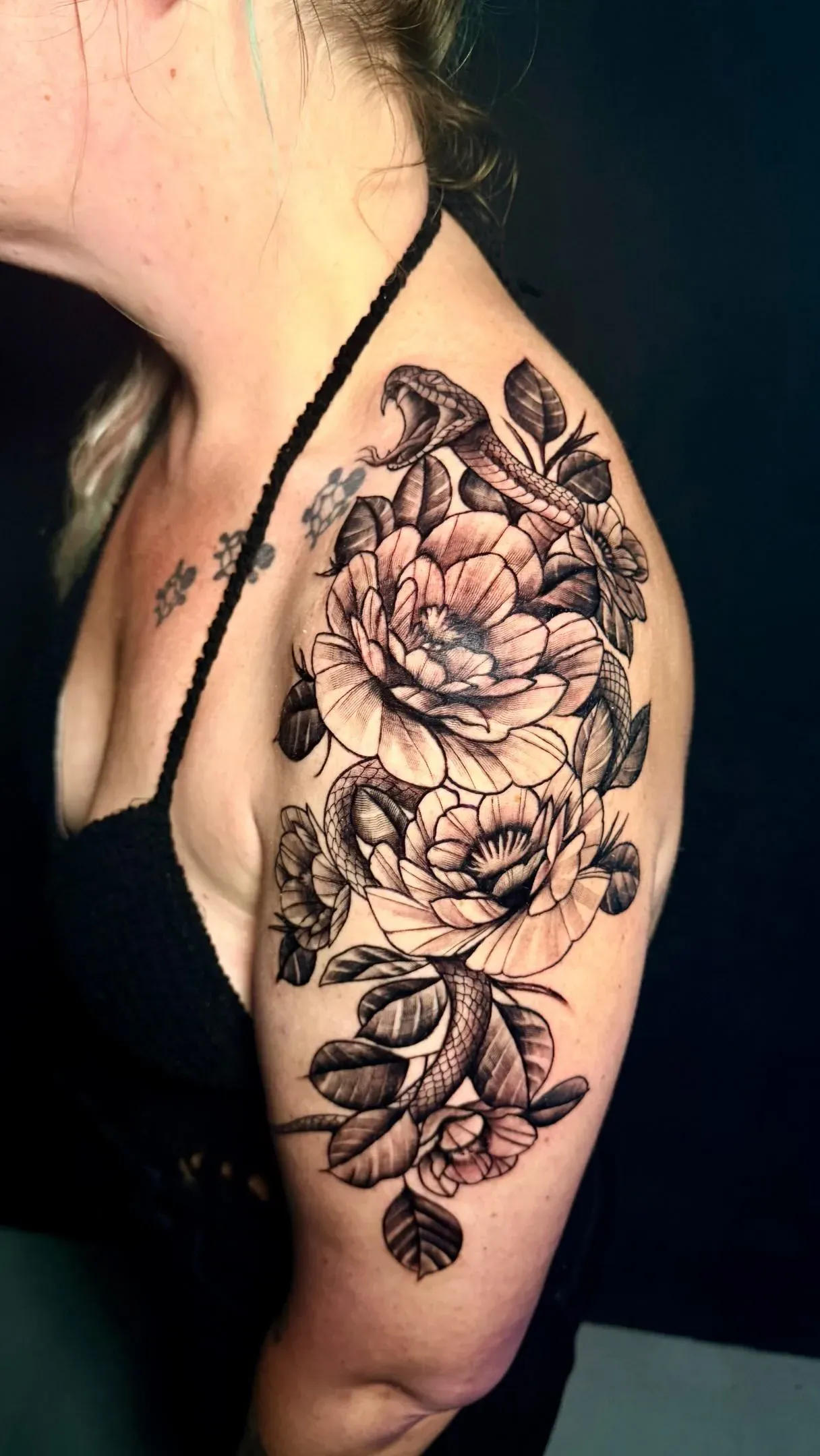 Floral shoulder piece tattoo by The Mafia Ink Bali