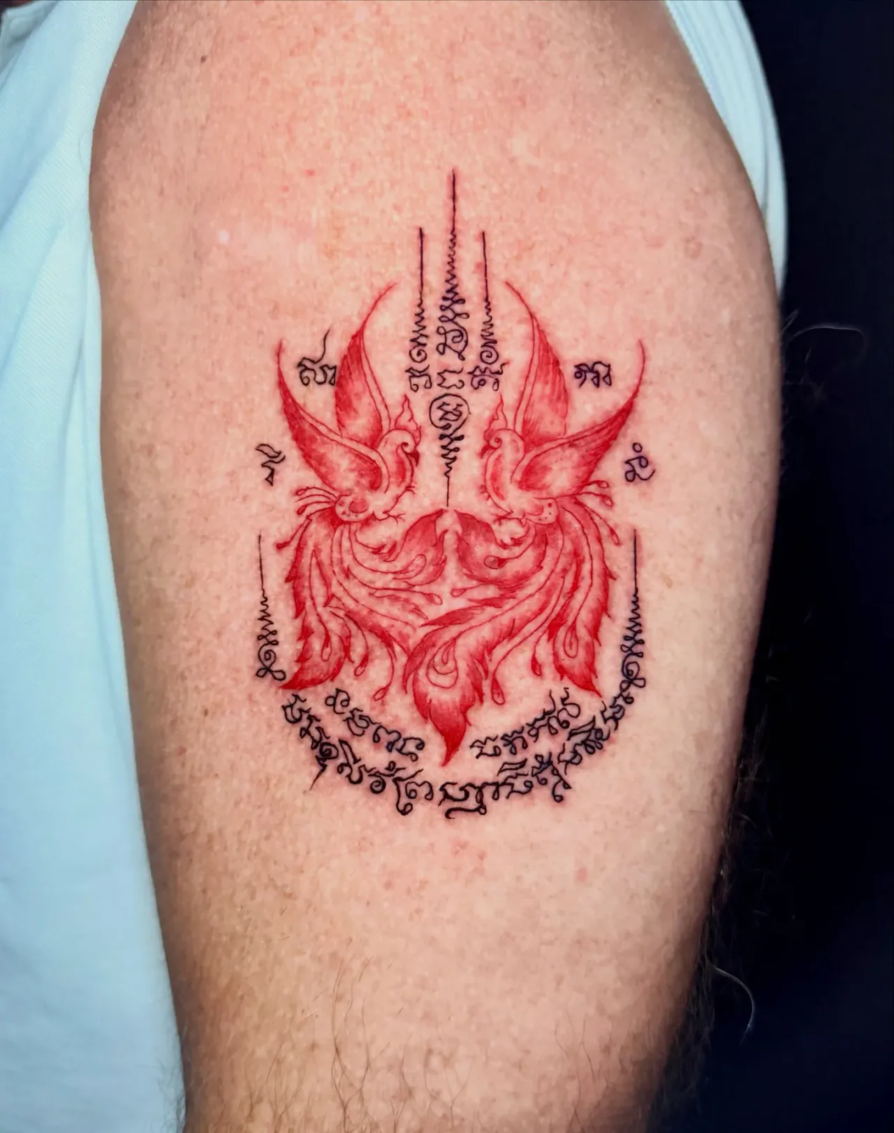 Red sak yant tattoo by The Mafia Ink Bali