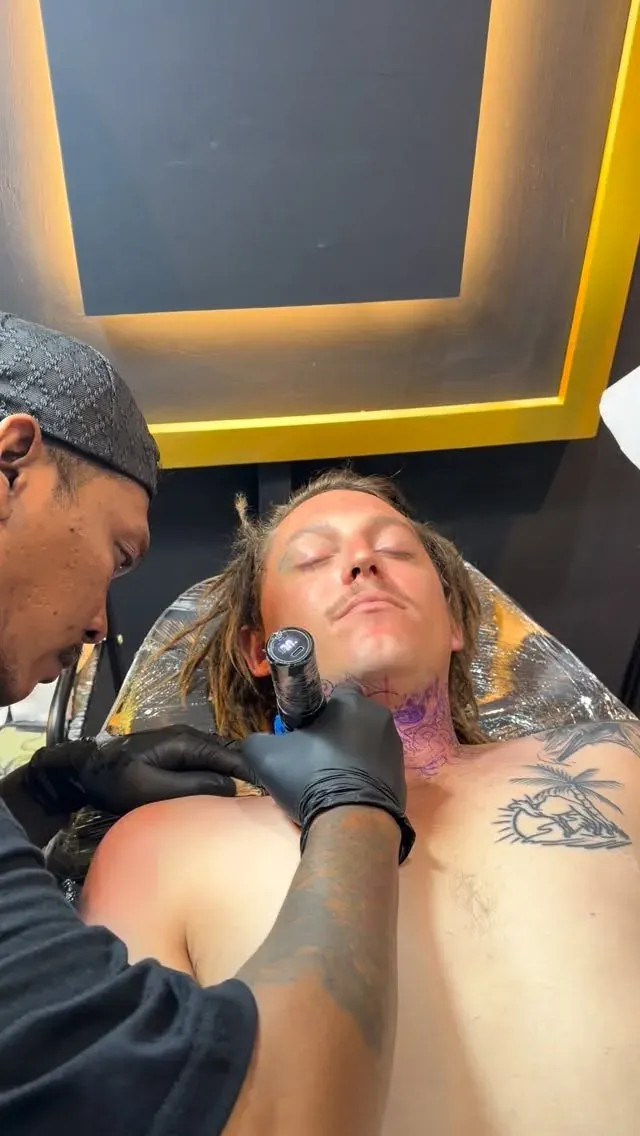 Neck tattoo session tattoo by The Mafia Ink Bali