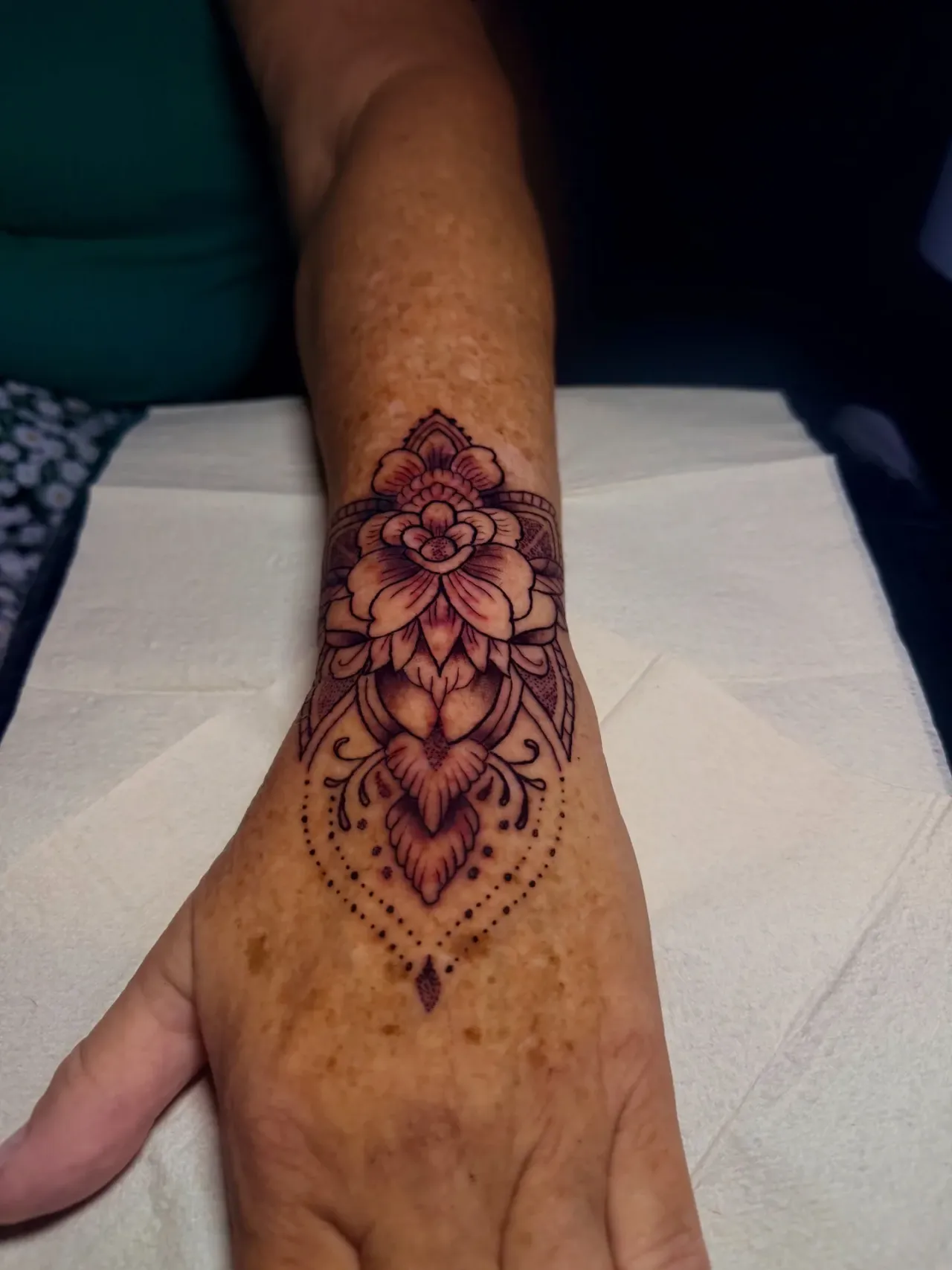 Floral hand tattoo — angle two tattoo by The Mafia Ink Bali
