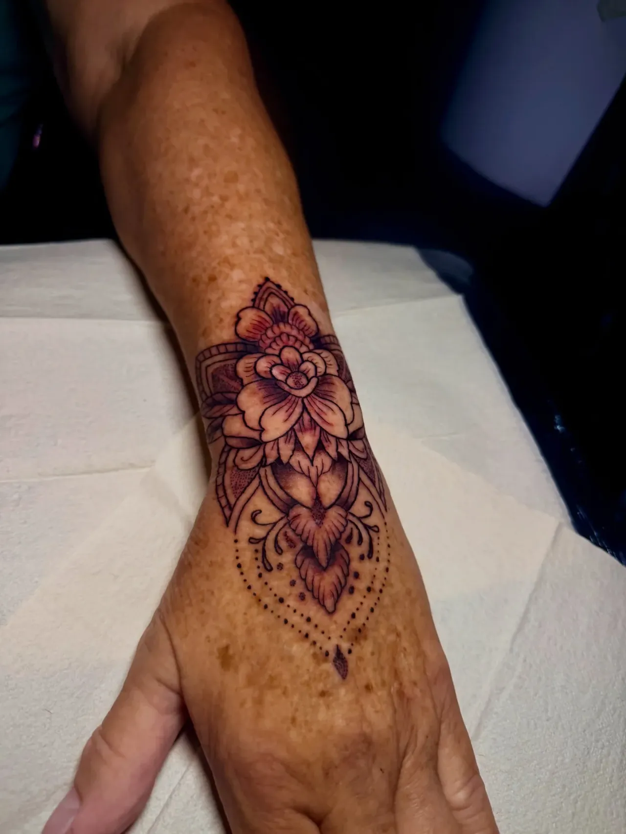 Floral hand tattoo — detail tattoo by The Mafia Ink Bali