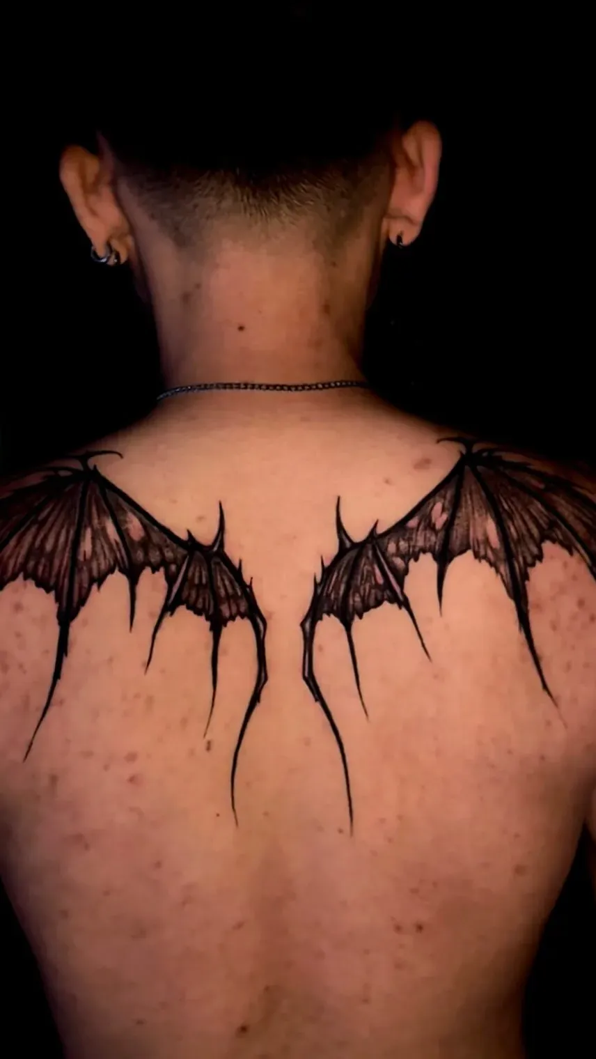 Bat-wing backpiece tattoo by The Mafia Ink Bali