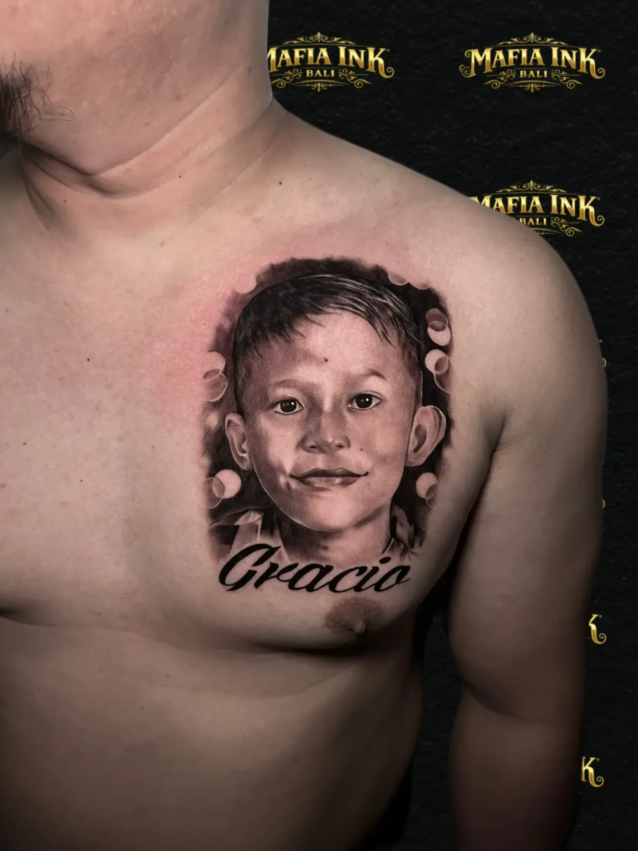 A portrait to remember tattoo by The Mafia Ink Bali